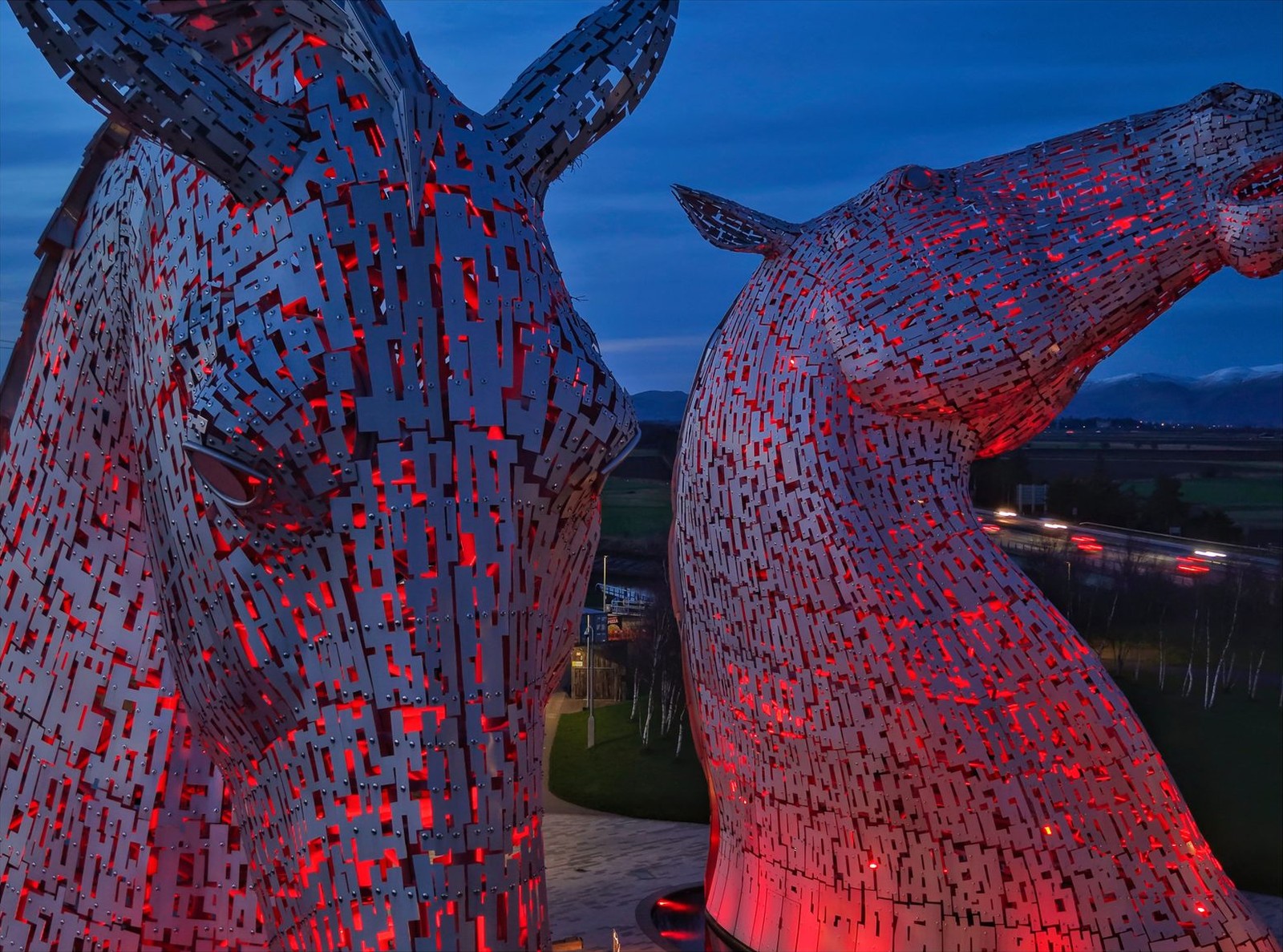 The Kelpies illuminated red for Chinese New Year